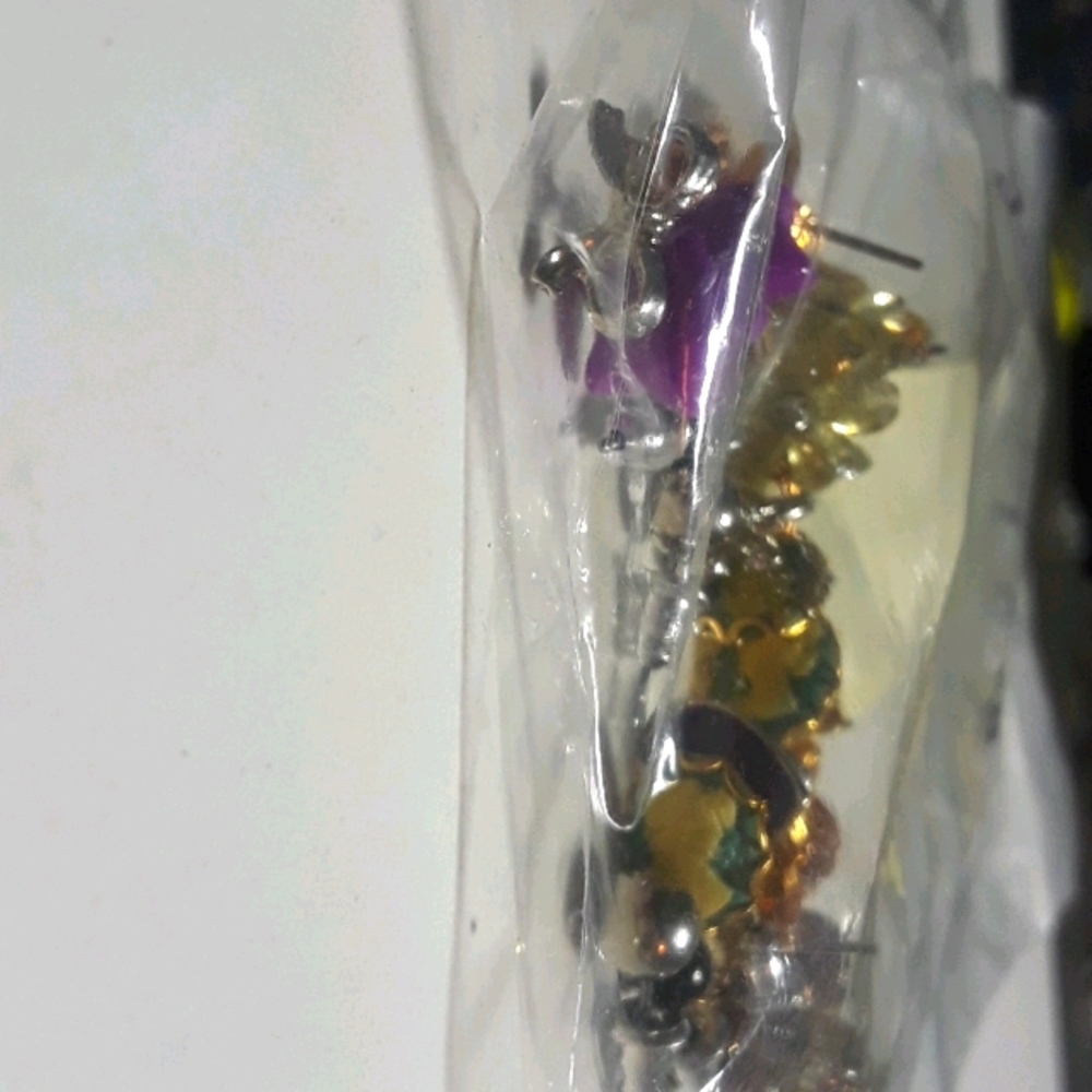 Multiple sets of bud earrings